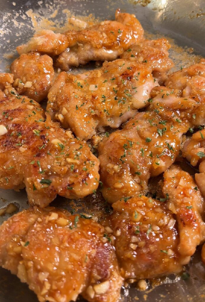 crispy honey chicken on a skillet