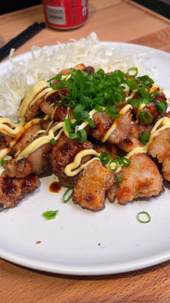 air fried chicken drizzled with mayo on a plate