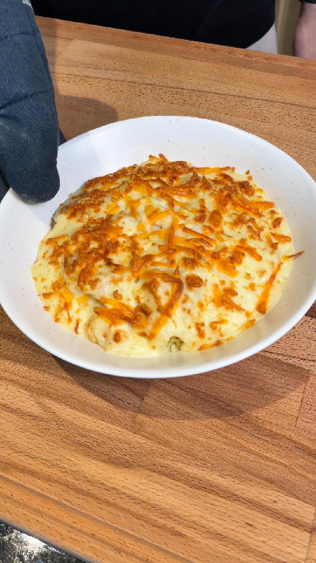 baked seafood rice serve on a cutting board