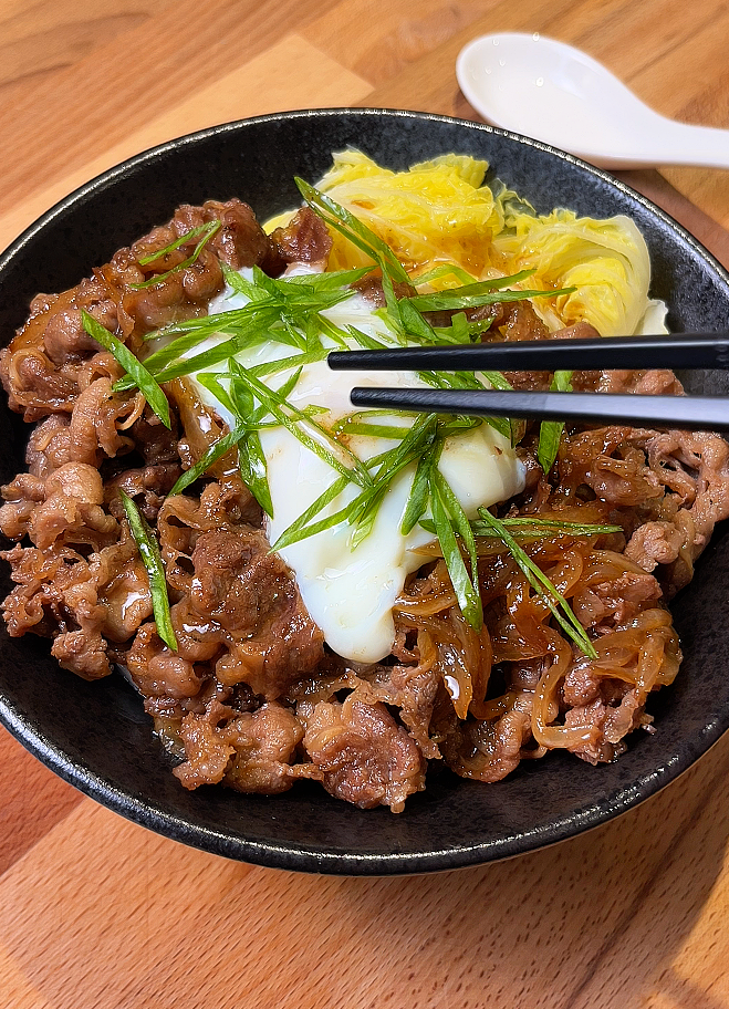 beef udon in a bowl